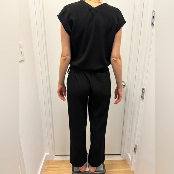 Black v-neck Theory jumpsuit with drawstring belt - Picture 4 of 5